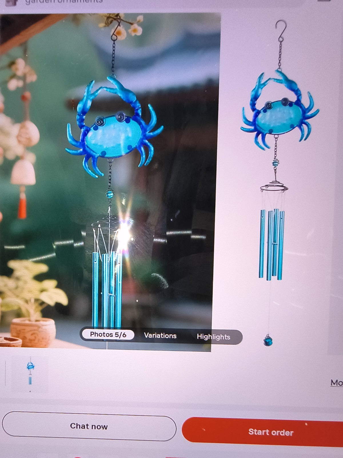 blue crab-themed wind chime featuring a vibrant blue crab at the top and silver-